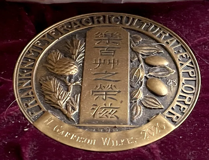 The Frank N. Meyer Medal awarded to H. Garrison Wilkes, 2020, in its presentation case.